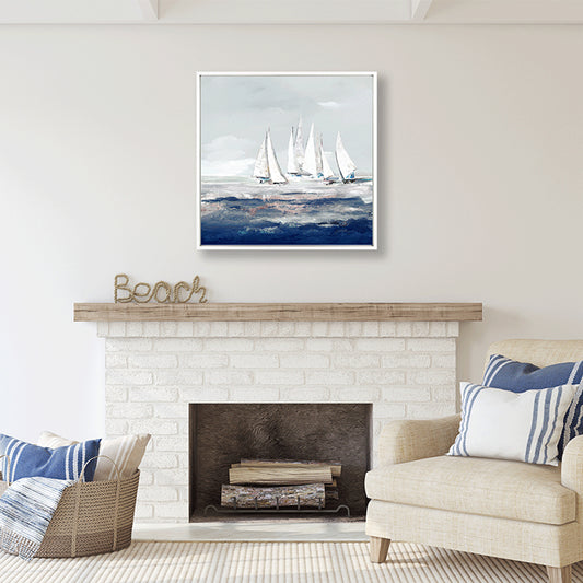 Coastal sailboat artwork in white frame