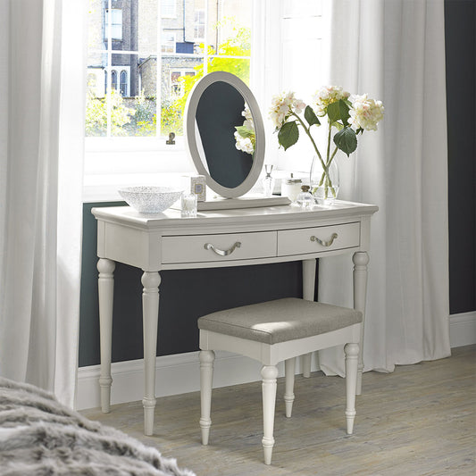 Oval shaped wooden vanity mirror finished in soft grey
