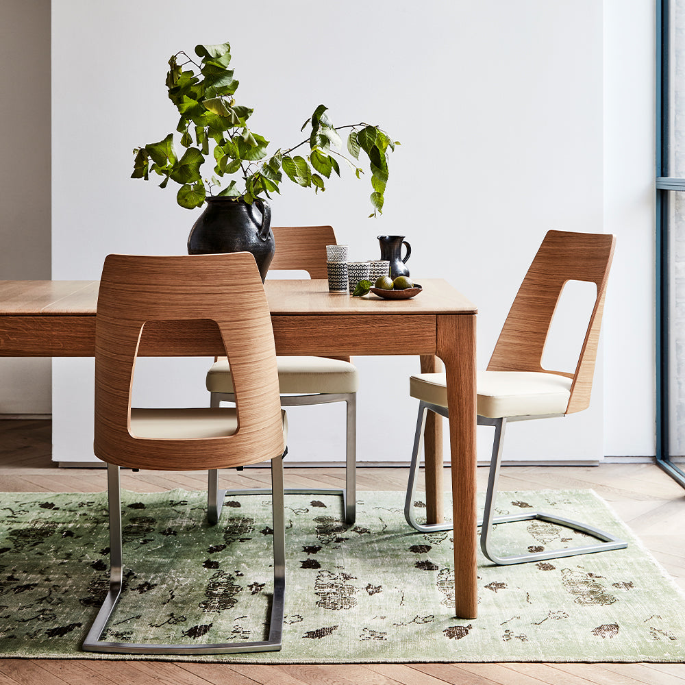 Ercol Romana solid oak dining table in clear matt finish
