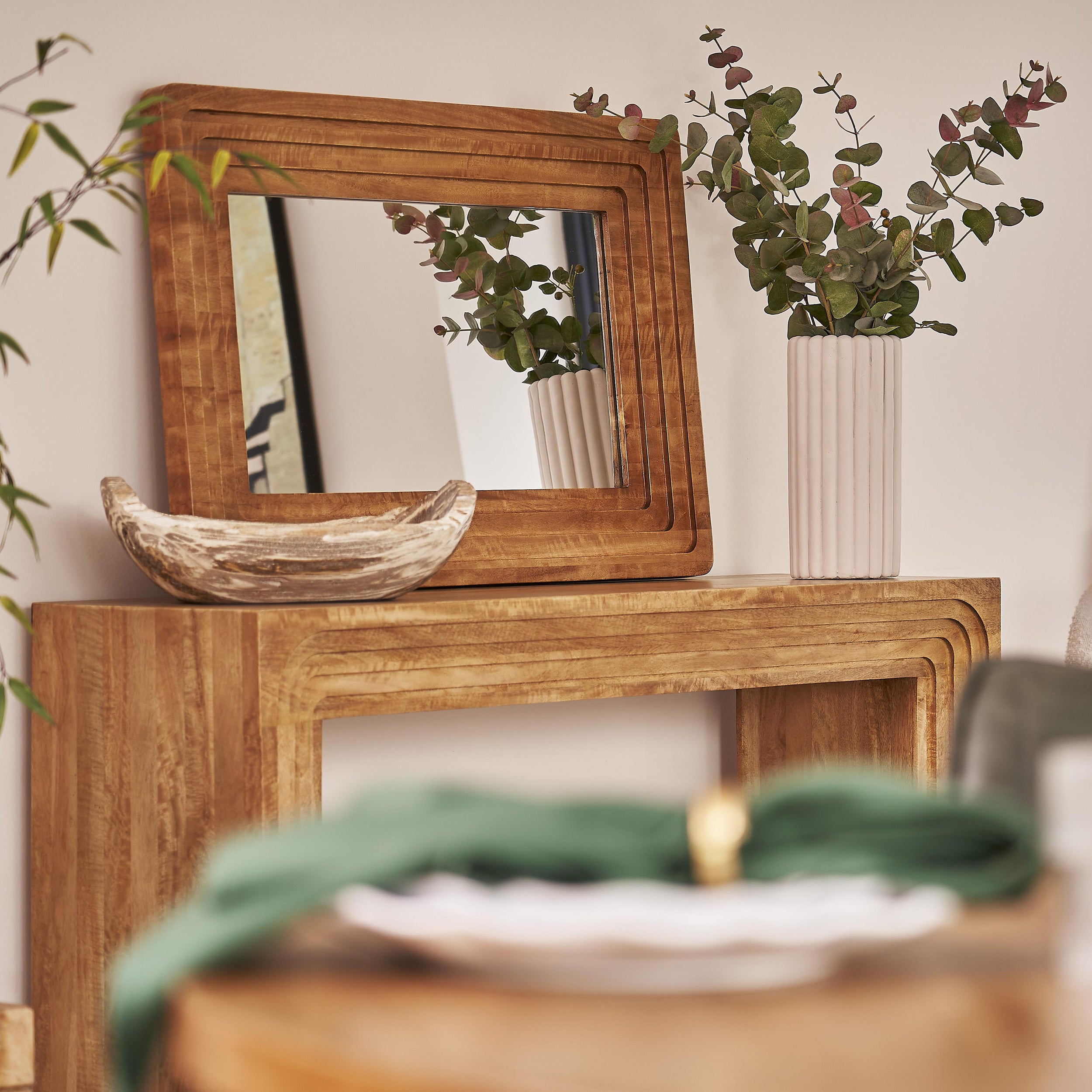 Pale mango wood console table with carved, layered arches