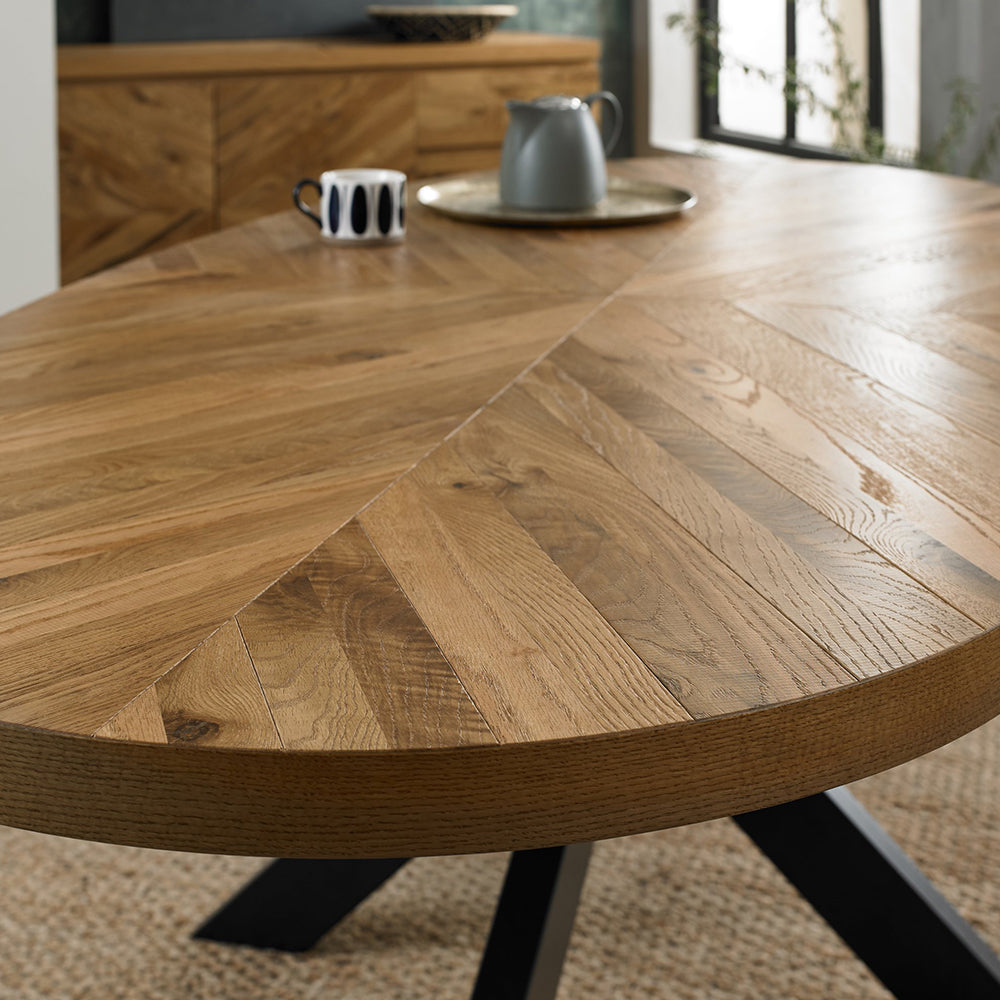 Solid oak 8 seater dining table with rustic oak marquetry tops & black powder coated metal base
