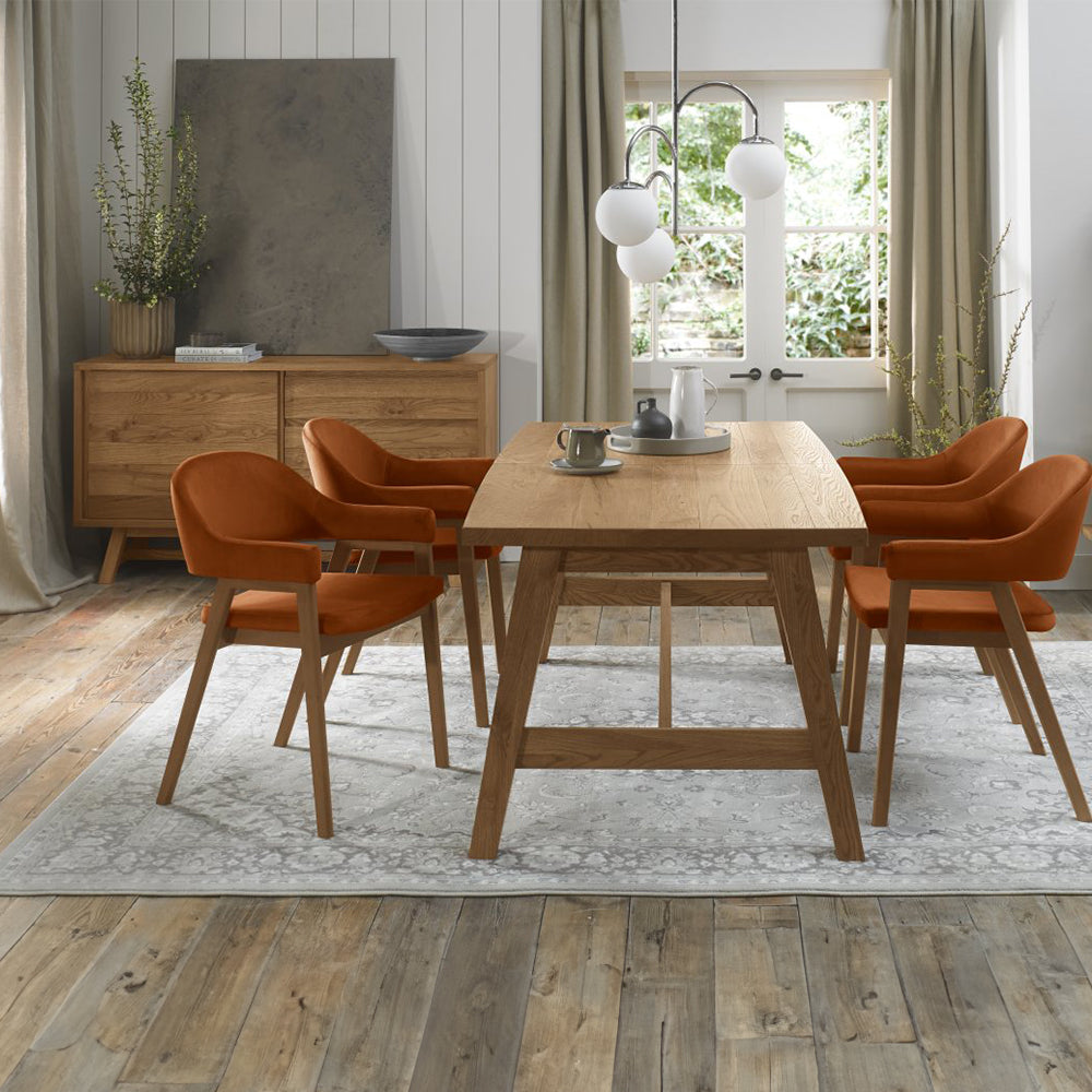 Rustic oak wide sideboard with laminated oak top and solid ash legs all in natural finish
