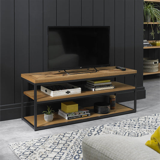 Oak veneer open entertainment unit with black powder coated metal base
