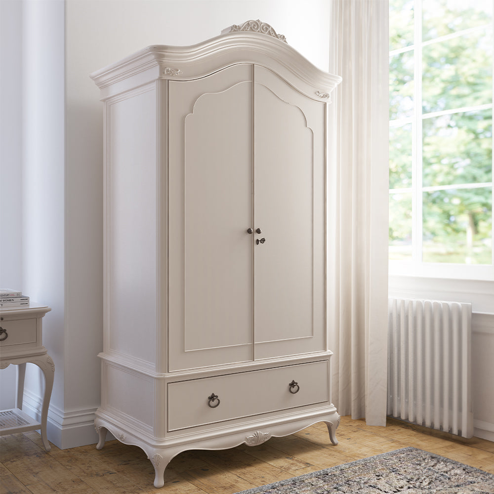 French inspired wooden double wardrobe in cream finish with antique bronze handles and bottom drawer
