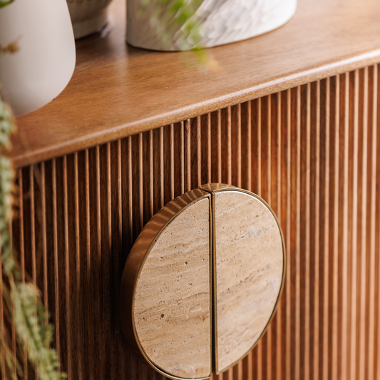 Fluted mango wood highboard with inset handles and travertine stone top