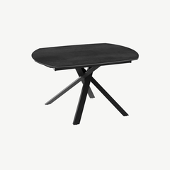 Black ceramic extending dining table with tempered glass and black steel lacquered base