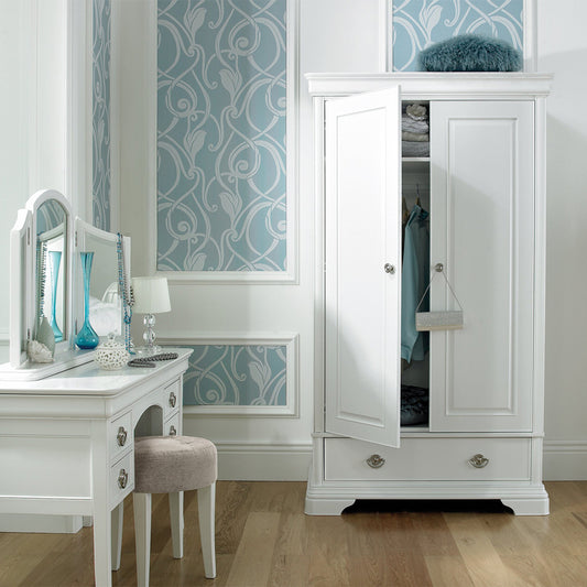 Wooden double wardrobe in painted white finish with silver handles and bottom drawer
