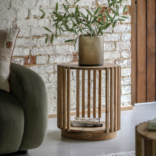 Slatted wooden side table in natural finish with lower storage shelf