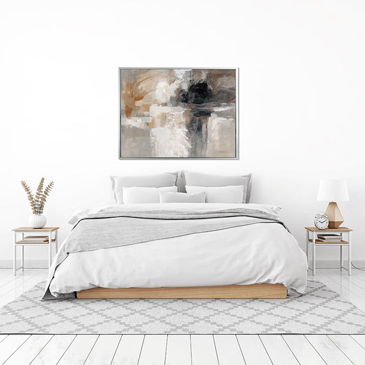 Abstract design artwork in shades of brown, grey and white placed on a sleek grey frame