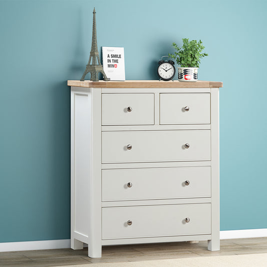 Painted off-white 2 over 3 chest with natural wood top and silver drawer handles 
