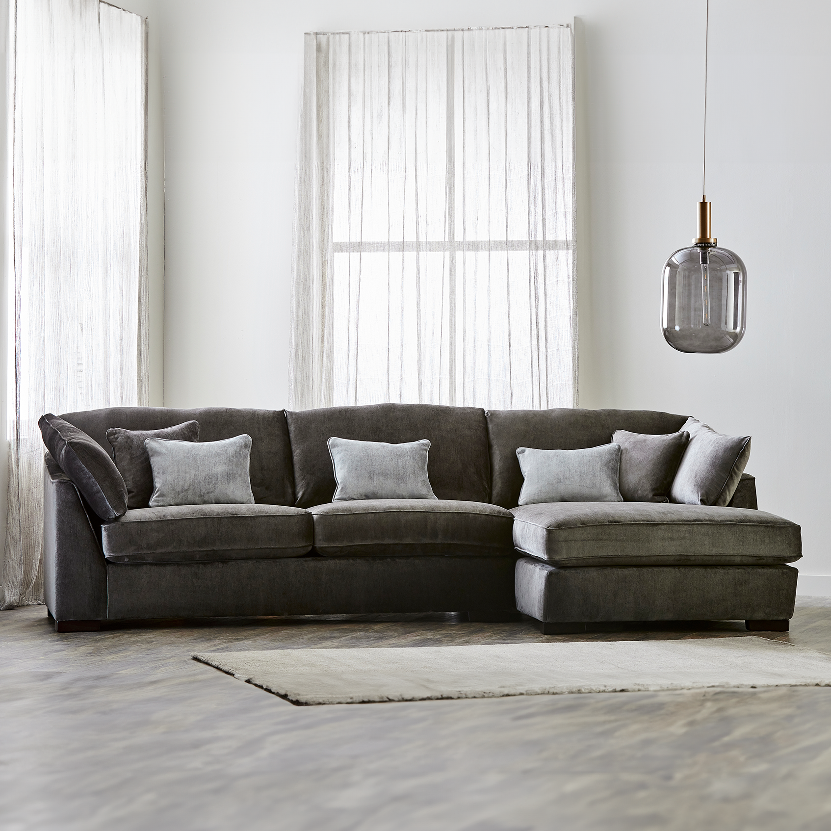 Sirius Chaise Sofa upholstered in dark grey fabric