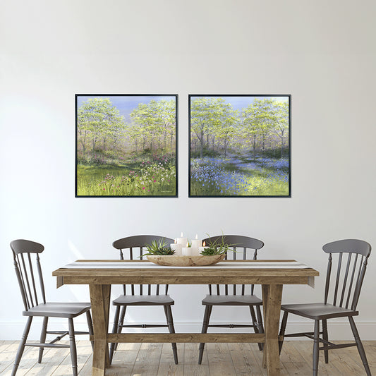 Summer meadow scene with green grass and trees in a sleek black frame