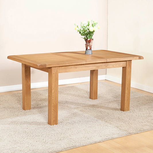 Solid wood extending dining table in natural oak finish