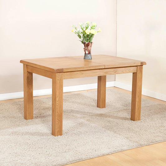 Solid wood extending dining table in natural oak finish