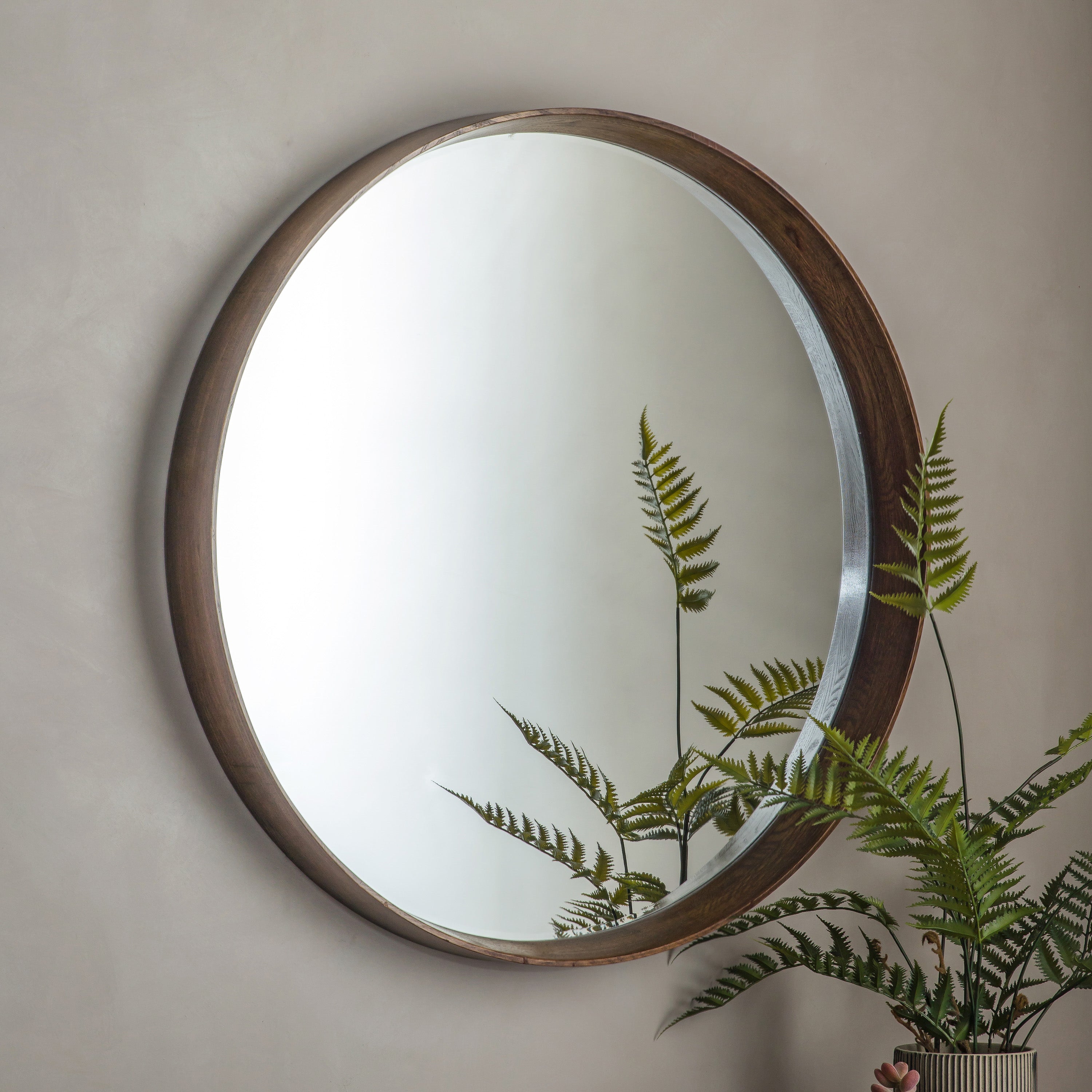 Large circular mirror with solid wood frame