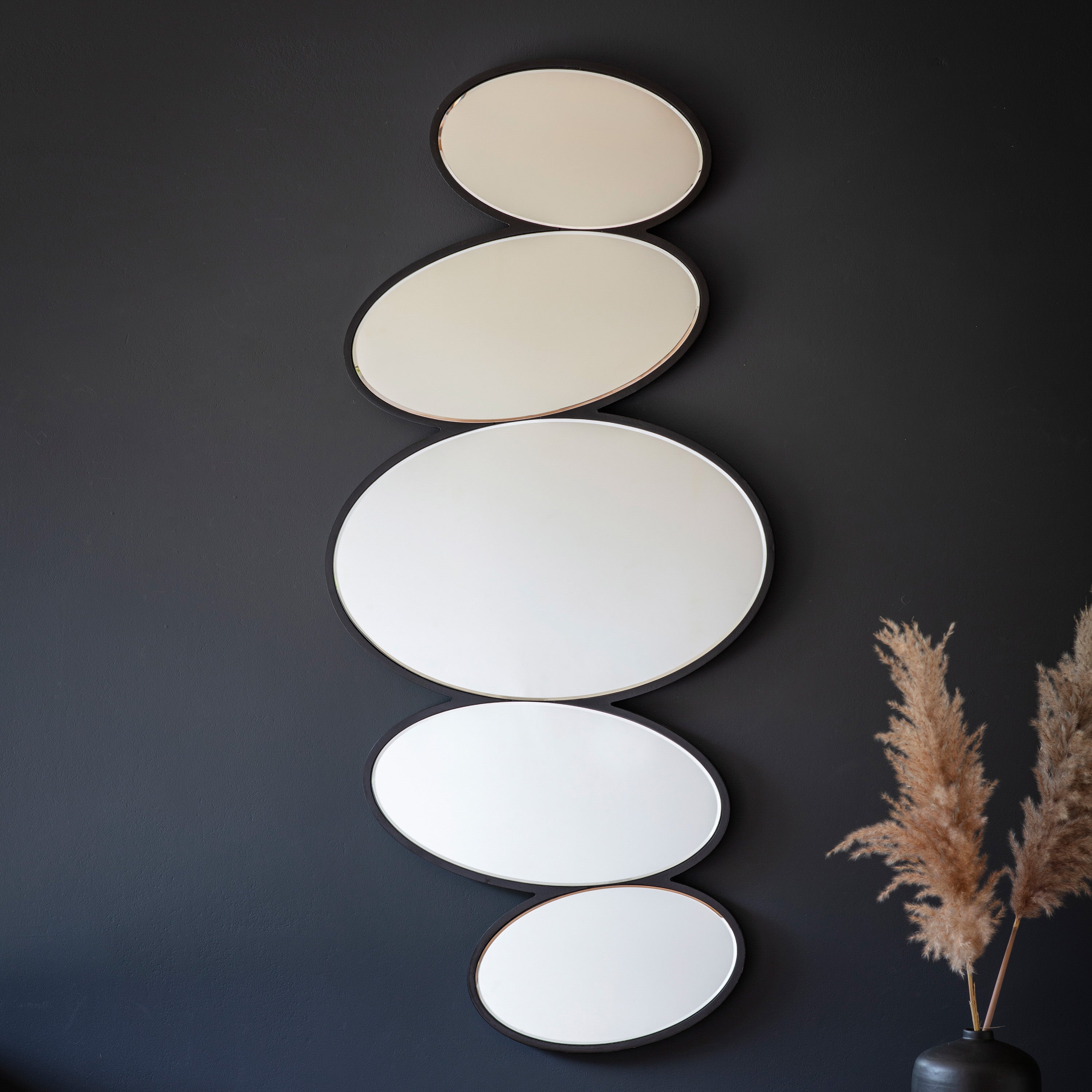 Black pebble stack mirror 