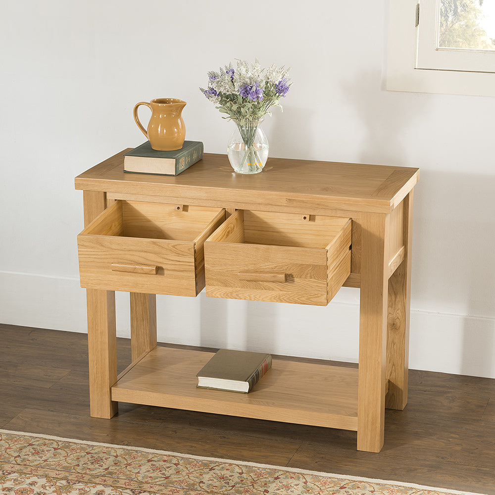 Oak large console table in natural finish with two drawers and lower storage shelf