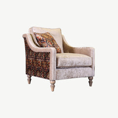 Luxury cream velvet chair with contrasting side panelling and wooden turned legs